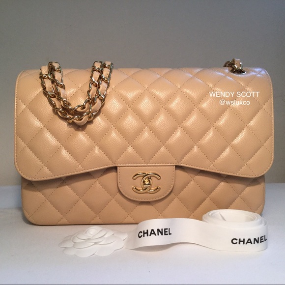 CHANEL Handbags - Chanel Beige Caviar Jumbo with GHW